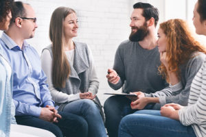 people talk in a circle in their valium addiction treatment program