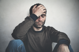 Man leans against wall, wondering about Ativan abuse
