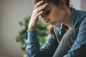 Person thinking about the connection between bipolar disorder and relationships