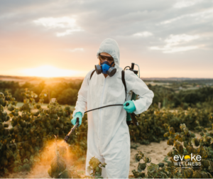 Man wears hazmat suit while dealing with weed